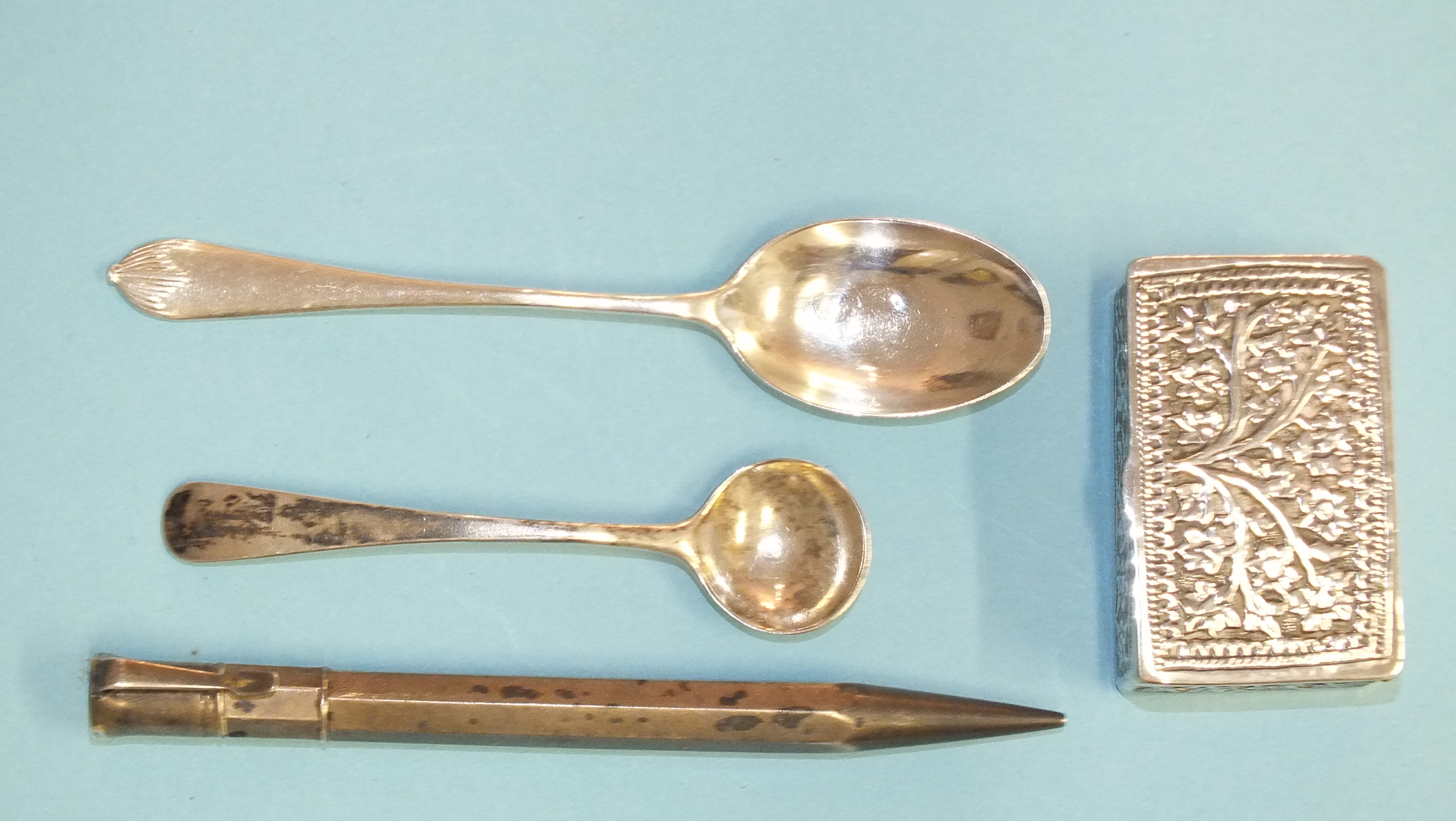 A Sampson Mordan & Co. silver propelling pencil, an Indian white metal snuff box and two small
