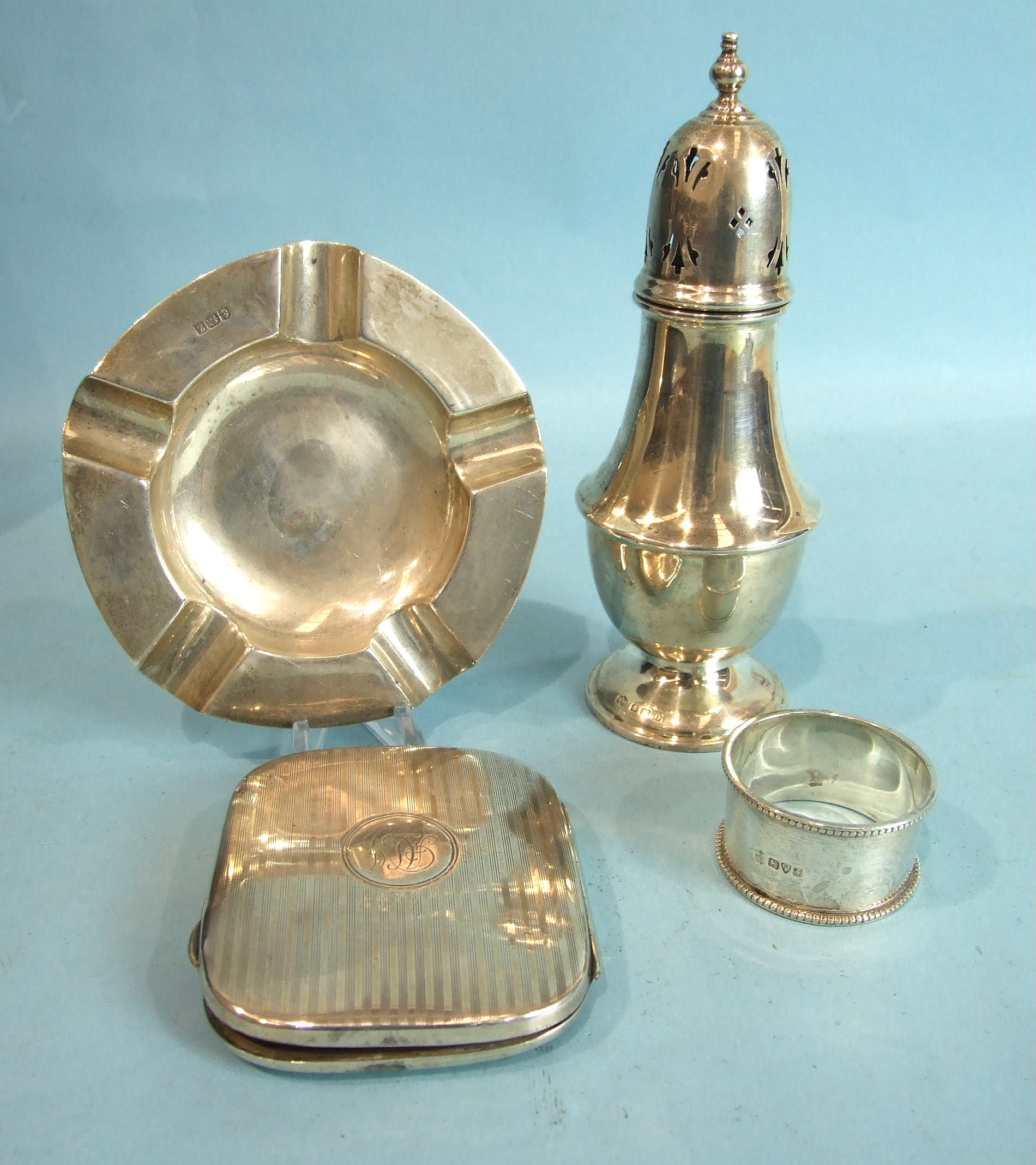 A 20th century sugar caster of baluster form, with pierced finialled lid, 18cm high, Birmingham