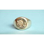 A signet ring with heraldic symbol, unmarked, (tests as 14ct approximately), stone setting vacant,