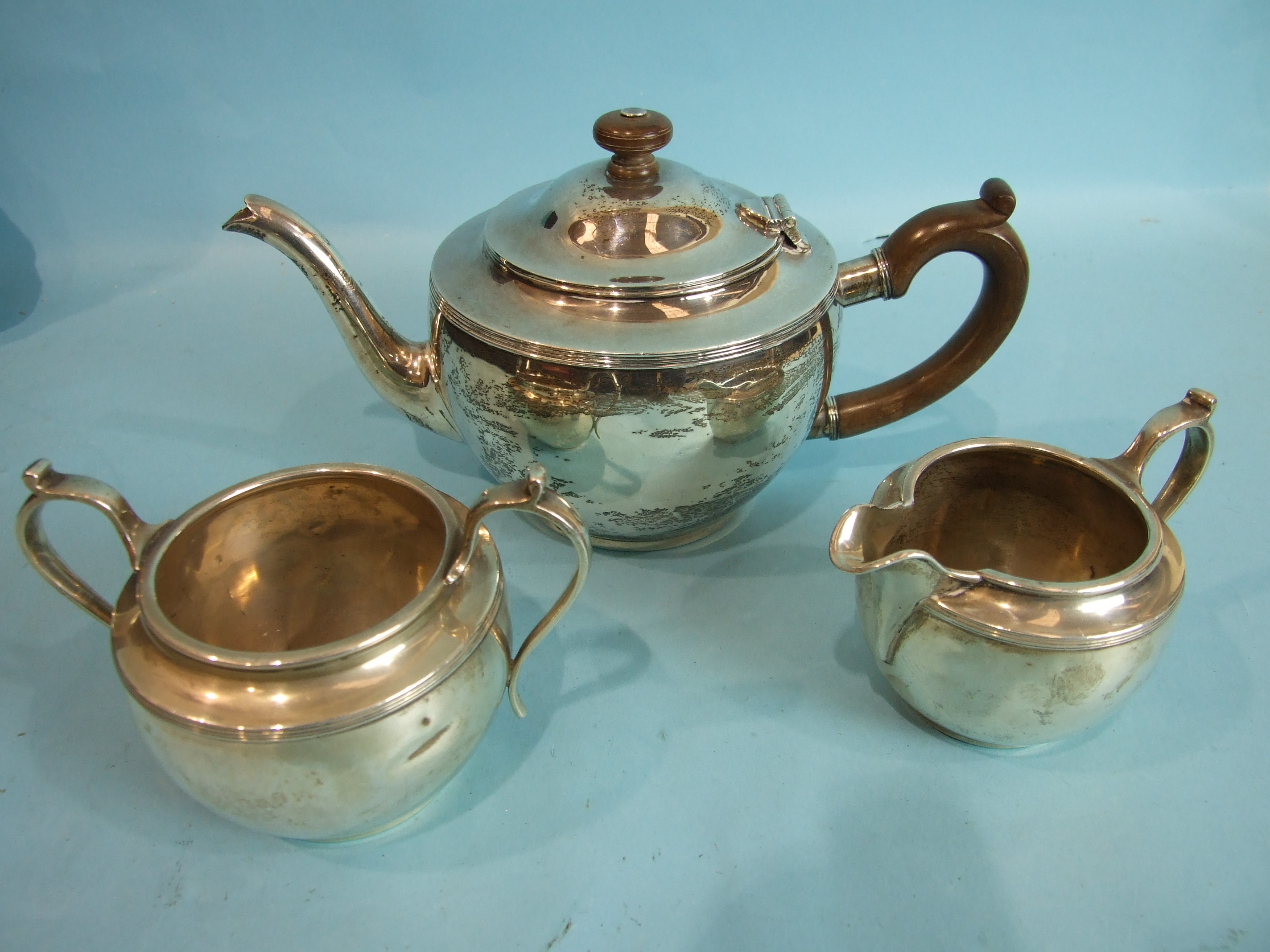 A plain circular three-piece tea service, London 1929, ___21½oz, inclusive, (dents overall). - Image 2 of 2