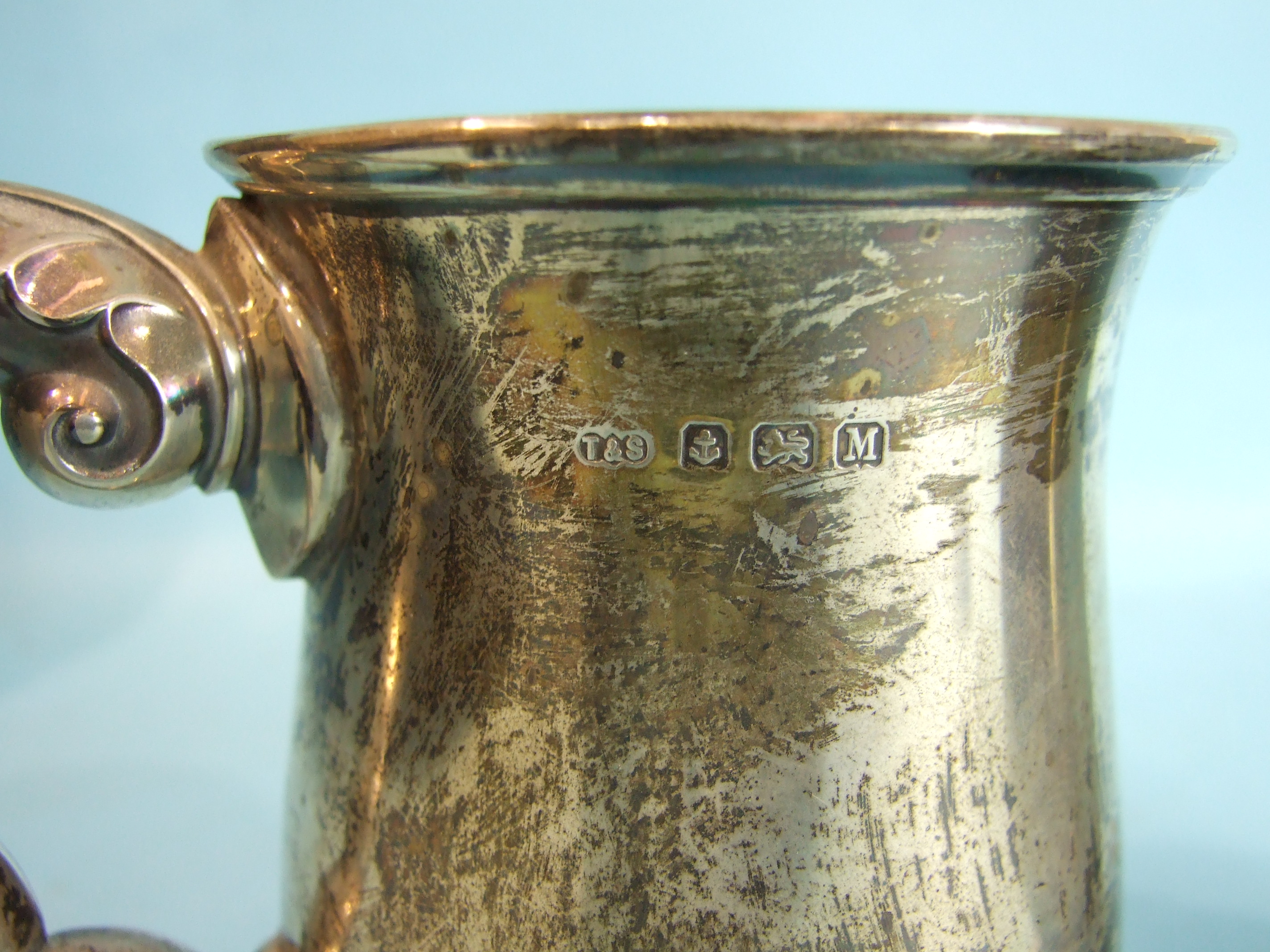 A baluster-shaped pint tankard with leaf-capped scroll handle, and presentation engraving, - Image 2 of 2