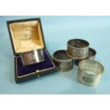 Five various silver napkin rings, one boxed, ___3.15oz.