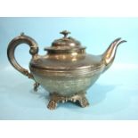A Victorian silver compressed teapot, the hinged lid with flower finial, raised on shell and foliate