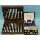 A set of twelve Mappin & Webb fruit or desert knives and forks, in fitted oak case, a set of six