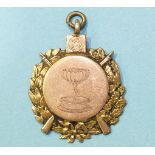 A 9ct rose gold medallion, Gen. Sir R Pole Carew Cup 1911 A Sleeman, 9.8g.