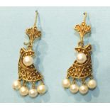 A pair of unusual pendant earrings, each with a pearl-set cannetile-decorated plaque, with four