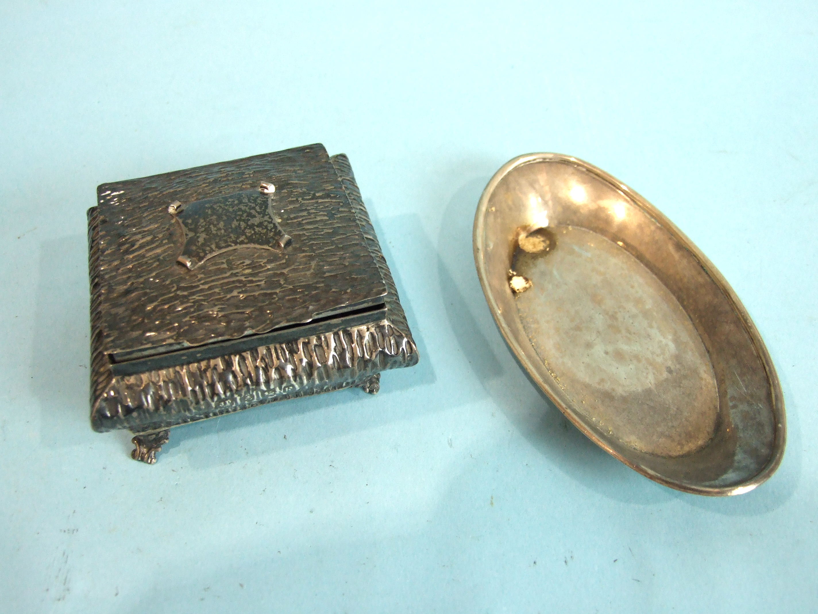 A square embossed jewellery box of compressed form, with overall textured finish, Birmingham 1907