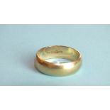 A 9ct gold wedding band, size U, 6.6g.