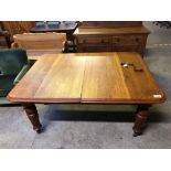 OAK EXTENDING TABLE WITH 2 LEAVES