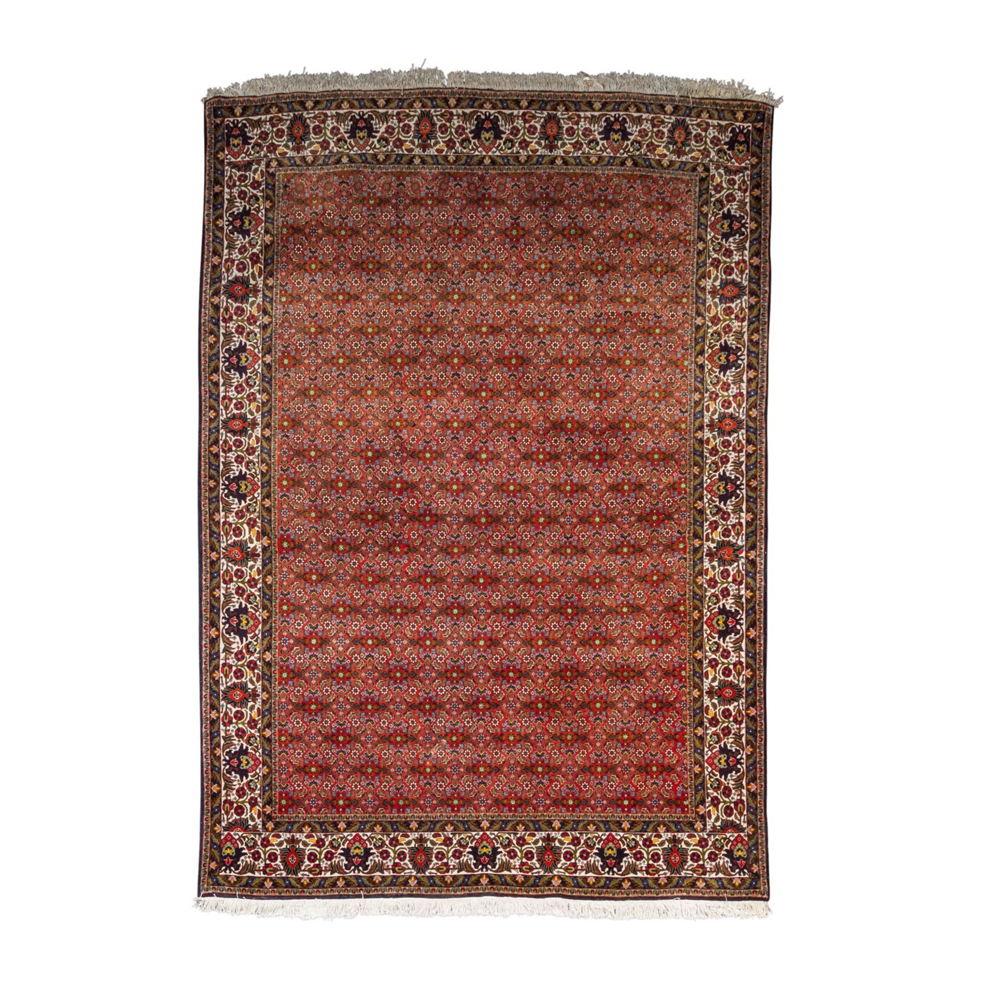 Orientteppich. MOUD/IRAN, 20. Jh., ca. 200x205 cm.Netzartig überspannt ein Herati-Muster das rote