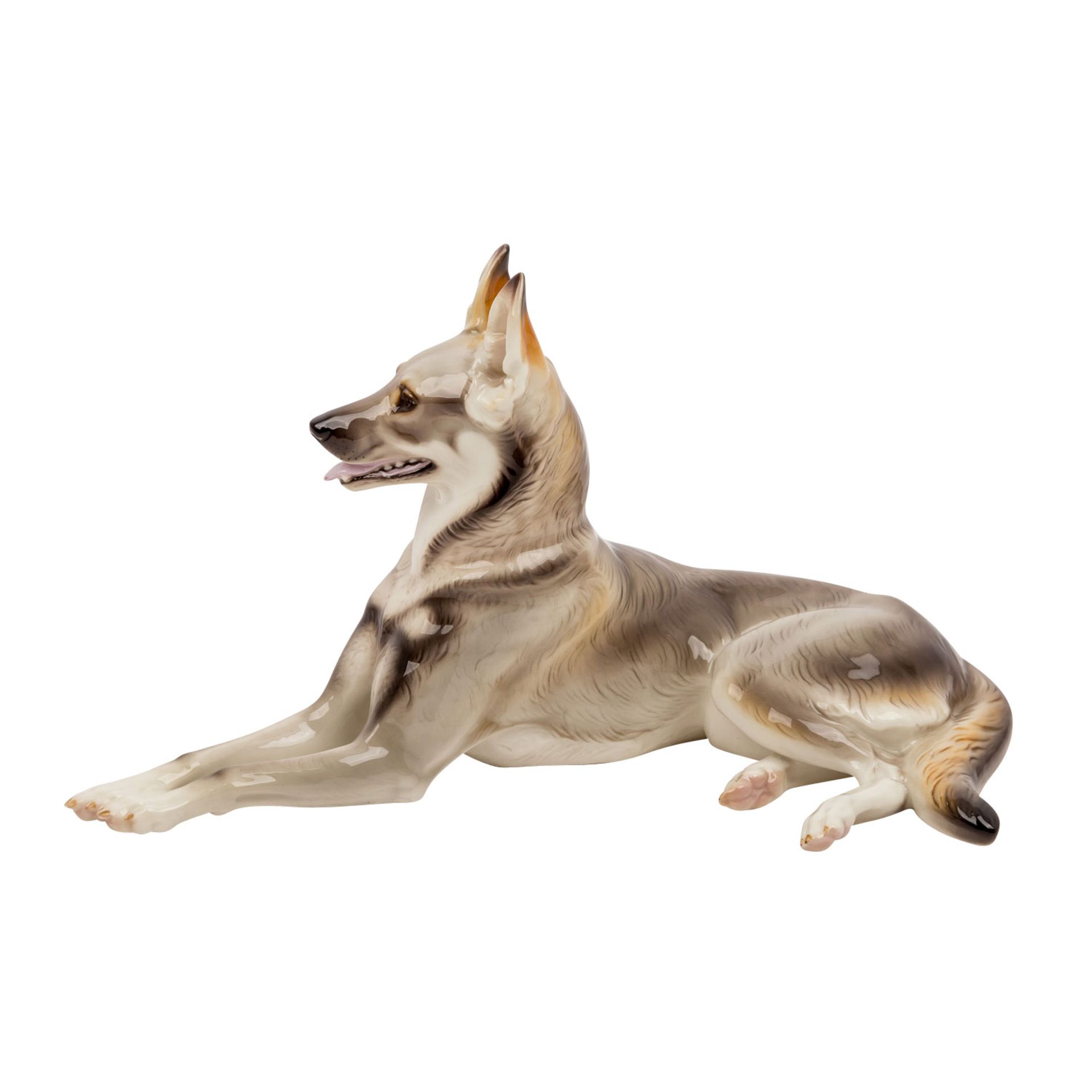 NYMPHENBURG, Porzellanfigur „Schäferhund“Entwurf Theodor Kärner, liegender Schäferhund mit erhobenem