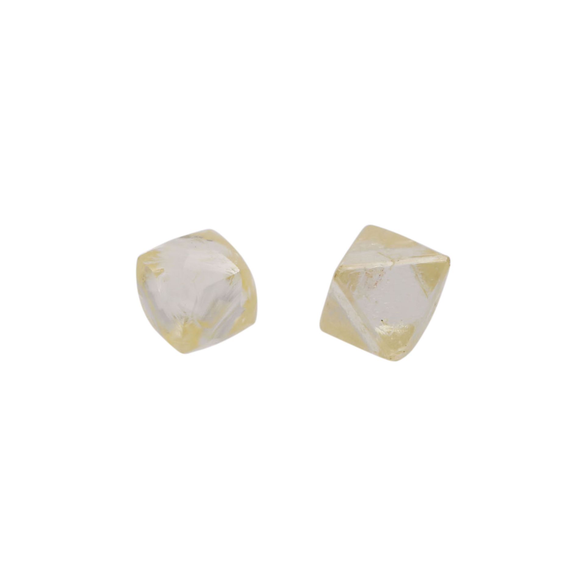 2 lose Rohdiamanten, zus. ca. 1,9 ct,