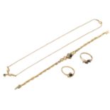 Schmuckkonvolut 4-teilig,GG 18K, netto ca. 14 g, bestehend aus 1 Collier, 1 Armband und 2 Ringen,