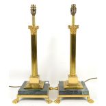 Pair of brass Corinthian column and marble table lamps on claw feet,