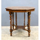 Oak octagonal occasional table with under tier on turned supports,