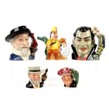 Royal Doulton Dracula character jug and Sir Walter Raleigh character jug, Punch and Judy teapot