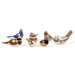 Royal Crown Derby paperweights, a collection of birds including Millenium Dove and Chaffinch Nesting