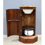 Victorian mahogany washstand with circular marble top, door on fluted column and octagonal base,