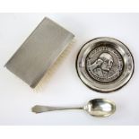A E Jones silver dish, a cased silver brush and comb set and a cased silver spoon