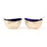 Cased pair of silver salts with blue glass liners, by Robert Pringle, Birmingham 1903