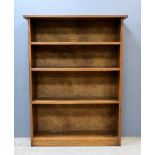 20th century walnut open bookcase with four shelves on plinth base,