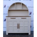 Cream painted oak dresser with two top drawers over cupboards