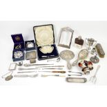 Group of silver items including five napkin rings, two leaf pin dishes, cased butter dish, modern