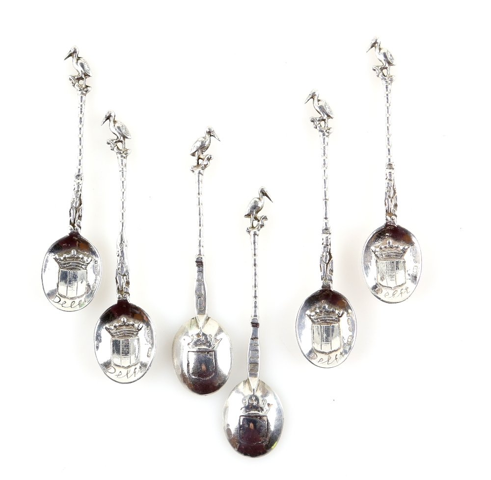 Set of six 19th Century continental silver spoons with stems formed with a woman figure and twist