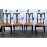 Set of four mahogany dining chairs with marquetry and mother- of-pearl inlaid decoration, on
