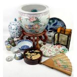 Collection of oriental ceramics and decorative items including a jardinière and stand, bowls, fan,