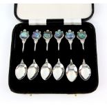 New Zealand shell mounted set of six cased set of sterling silver spoons