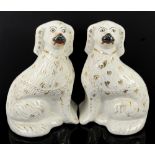 Pair of 19th century Staffordshire pottery spaniels,