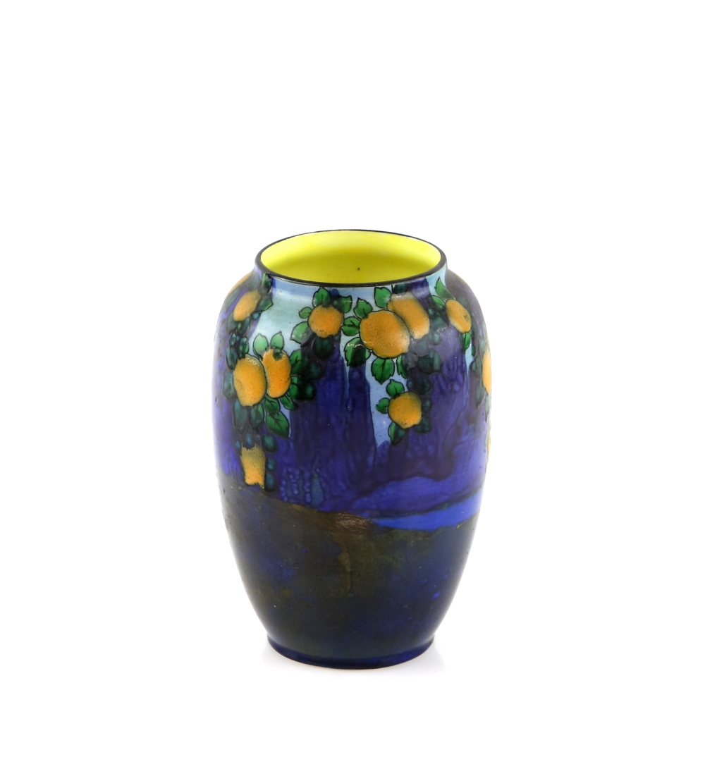Doulton an early 20th C porcelain vase painted in enamels, orange trees on a blue landscape, 16.5cm.