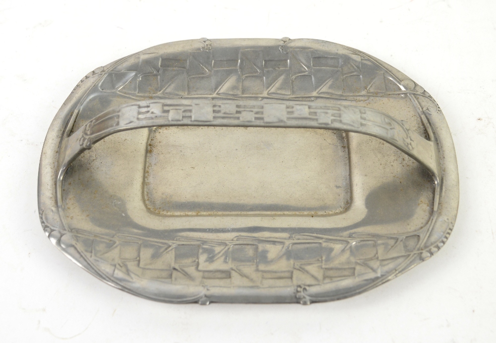 Archibald Knox for Liberty & Co., Tudric pewter cake basket of rounded shallow oblong form with