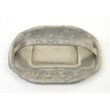 Archibald Knox for Liberty & Co., Tudric pewter cake basket of rounded shallow oblong form with