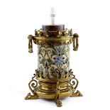 Doulton Lambeth stoneware lamp, incised formal floral decoration, in brass mount with scrolling feet