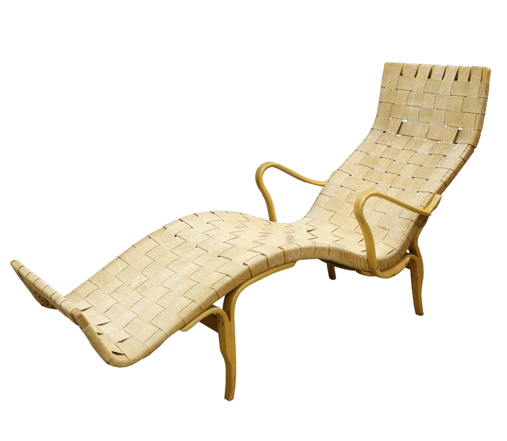 Bruno Mathsson (Swedish, 1907-1988), a Pernilla chaise longue in beech with woven webbing designed