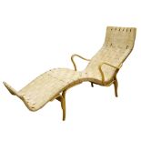 Bruno Mathsson (Swedish, 1907-1988), a Pernilla chaise longue in beech with woven webbing designed