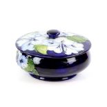 Moorcroft 'Blue Hibiscus' pattern lidded bowl with tube lined decoration, painted and impressed