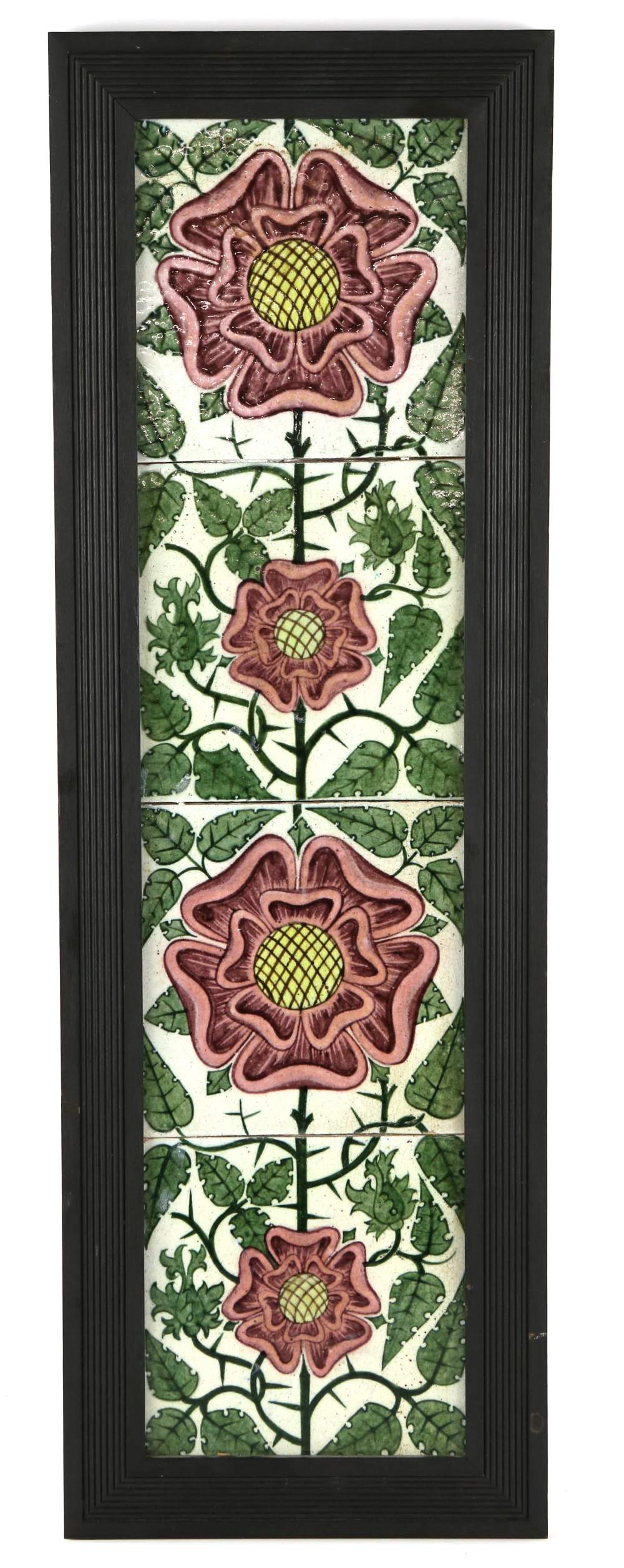 William de Morgan four Tudor Rose tiles framed as one with continuous design of flower heads and