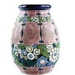 A large vase with enamelled decoration of flowers in relief, on a pink ground, marks for Amphora