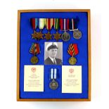 Group of six medals framed with certificates and a photograph, WWII War Medal, Africa Star, 1939-