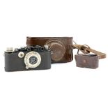 Leica III rangefinder camera circa 1933, black, serial number 112706, with Leica Elmar 50mm 1:3.5
