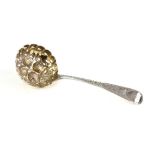 19th Century silver sifter ladle with gilt fruit design bowl, London 1825.