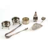 Selection of silver items to include pair of salts cruets tongs and 830 grade scene.