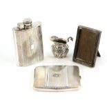 Selection of silver and white metal items to include a hip flask, creamer, frame and case.