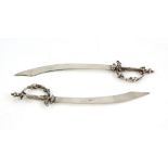 Novelty pair of Egyptian silver sword form letter openers.