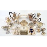 Large group of silver-plated items including two cased flatware sets, tea-service, sauce boats,