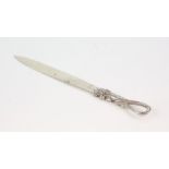 Novelty sterling silver letter opener with handle in the form of a lizard .