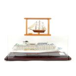 Maritime Replicas model of a cruise liner in case, another model of a ship and a model replica of